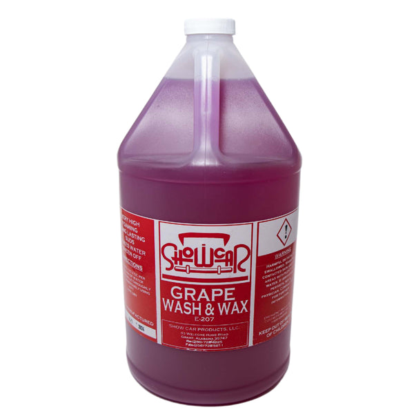 A gallon size plastic bottle of Show Car Grape Wash & Wax with red and white labeling.