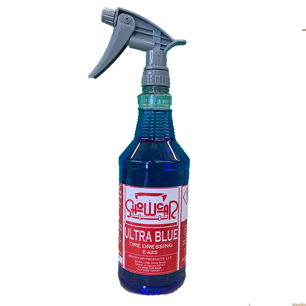 A blue bottle of Show Car Ultra Blue Tire Dressing with a white label and red lettering.