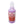 A quart bottle of a light pink liquid with a red ShowCar Show Room Shine label on a white background.