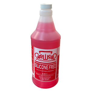 A quart bottle of Showcar Silicone Free dressing on a white background
