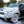 An SUV being covered in Showcar Wash-N-Wax soap using a foam cannon