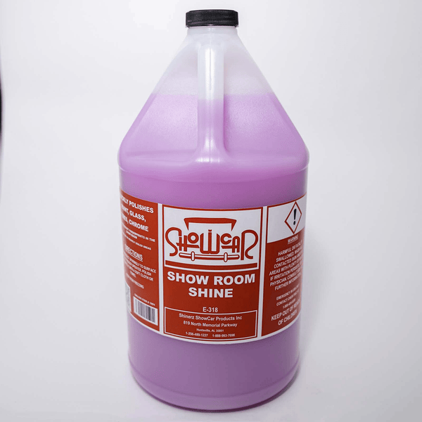 A gallon jug of a light pink liquid with a red ShowCar Show Room Shine label on a white background.