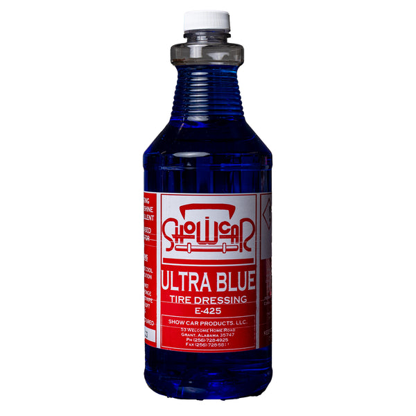 A blue bottle of Show Car Ultra Blue Tire Dressing with a white label and red lettering.